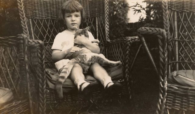 #34 Girl Sitting With Cat