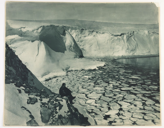 #1 F. Bickerton looking out over seas near Commonwealth Bay, 1912