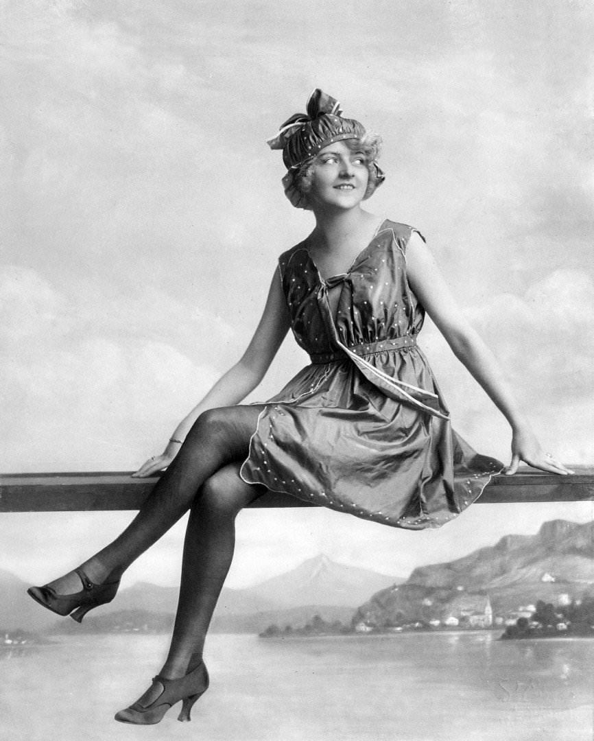 #16 Actress Elsie Marson in a red silk swimsuit with white embroidered spots, 1918