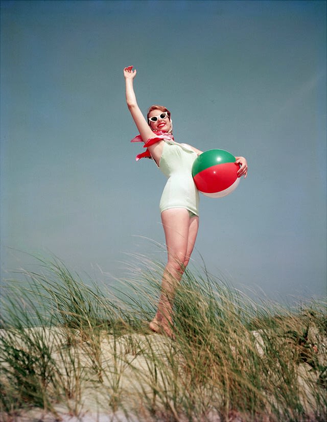 #62 A young woman in a bathing suit, 1956