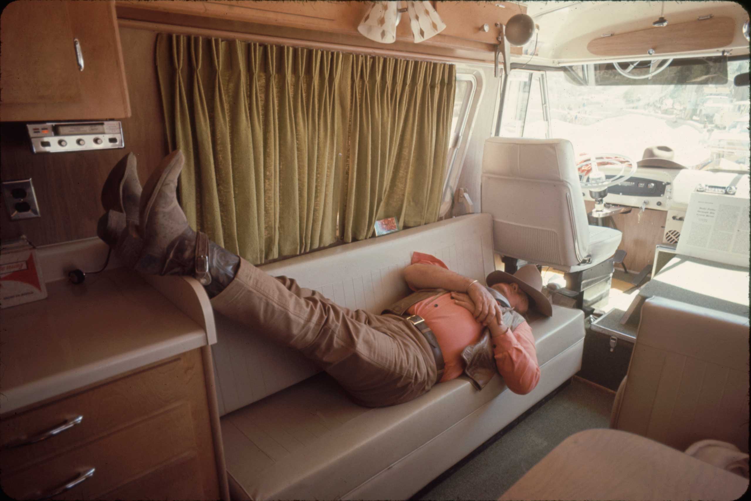 John Wayne takes a break during the filming of ‘The Undefeated’, 1969