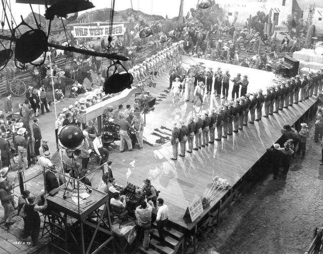 Busby Berkeley directs Judy-Garland and Mickey Rooney in MGM’s film “Girl-Crazy”, 1943