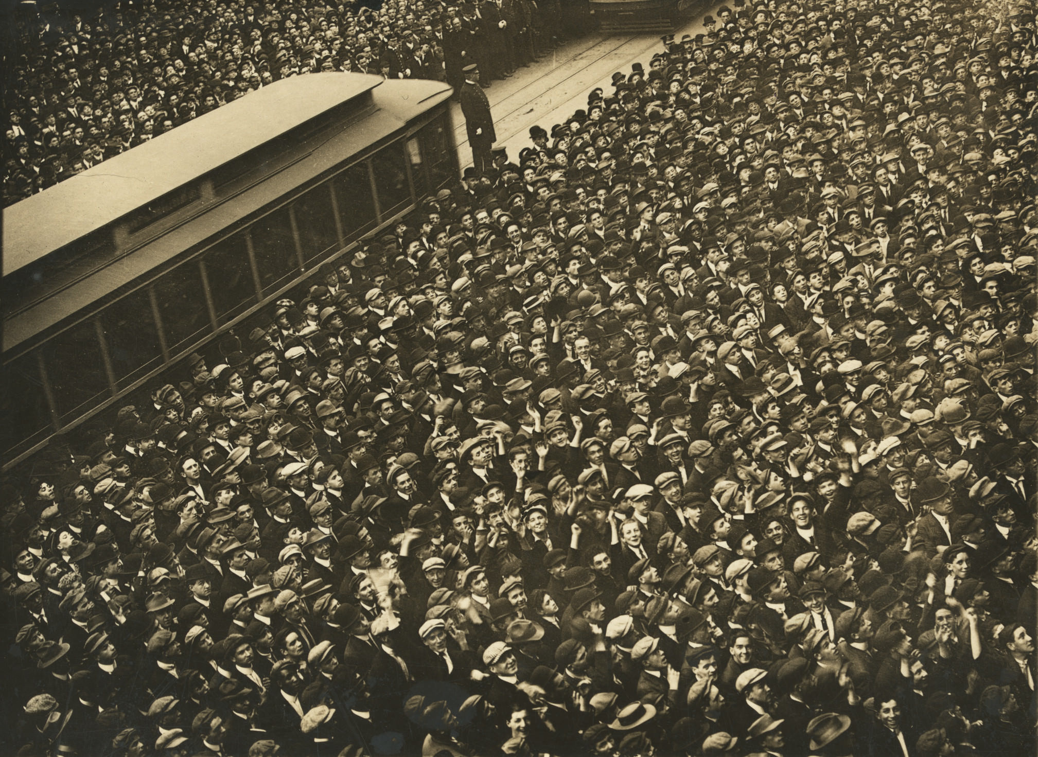 #4 A multitude of humanity stands outside the New York Herald Building watching the Play-O-Graph