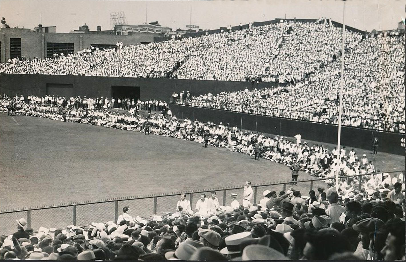 Boston’s New Fenway Park overcrowded, some fans are sitting in the outfield, 1934