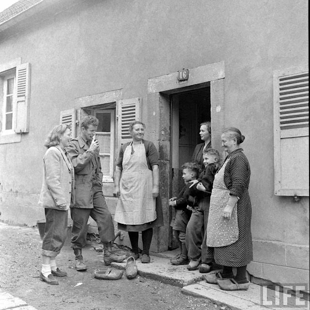 #21 Ernest Kreiling and his bride talking to local community.