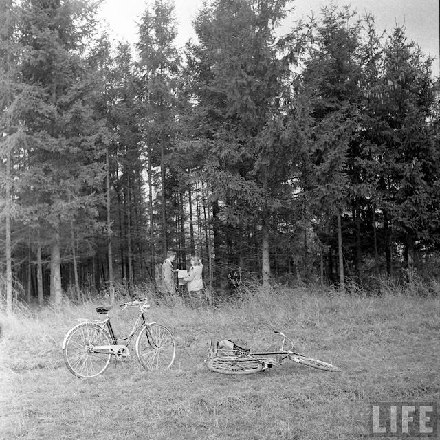 Ernest Kreiling and his bride look at the map.