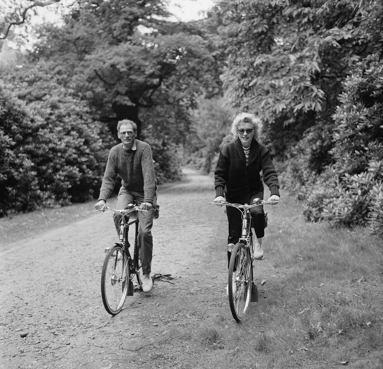 #17 Marilyn Monroe cycling with her husband Arthur Miller, 1956