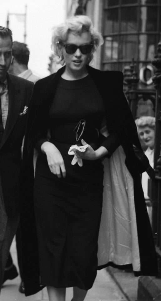 #29 Classy Marilyn doing a bit of shopping in London during her four-month stay in 1956