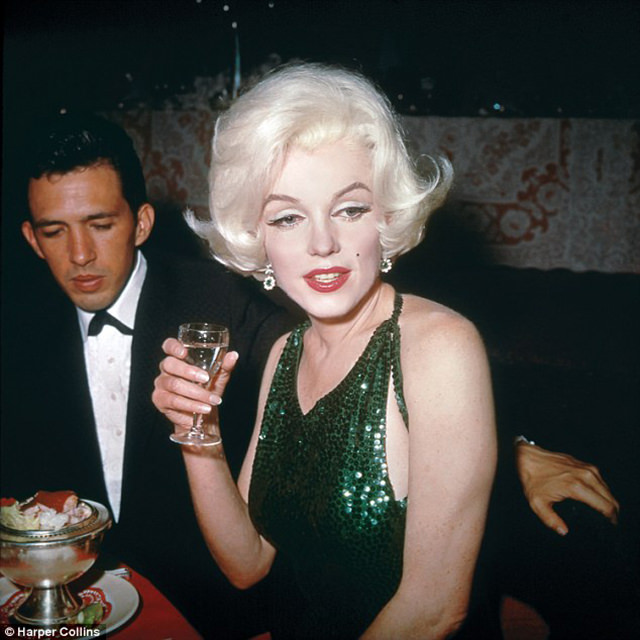 #78 Marilyn with her date and boyfriend Mexican screenwriter Jose Bolanos at the Golden Globe Awards on March 5, 1962