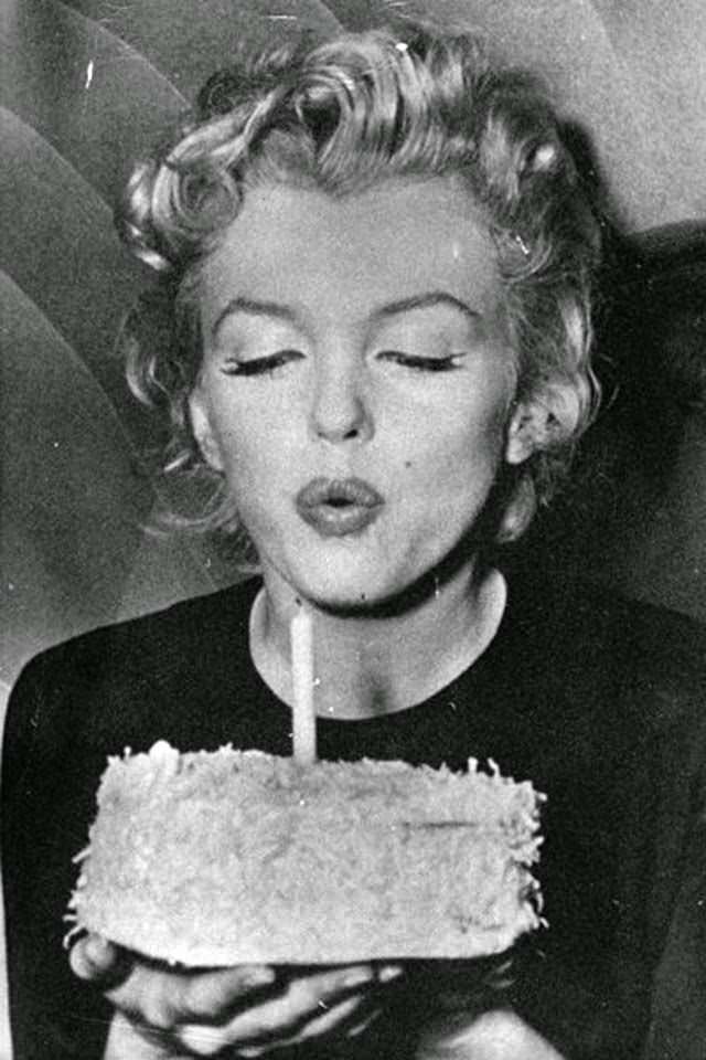 #60 Marilyn blows out candles on her 30th birthday, 1956