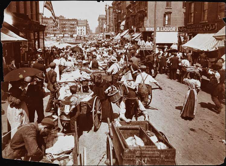 #4 Hester Street crowded with women shopping and push-cart peddlers, 1898