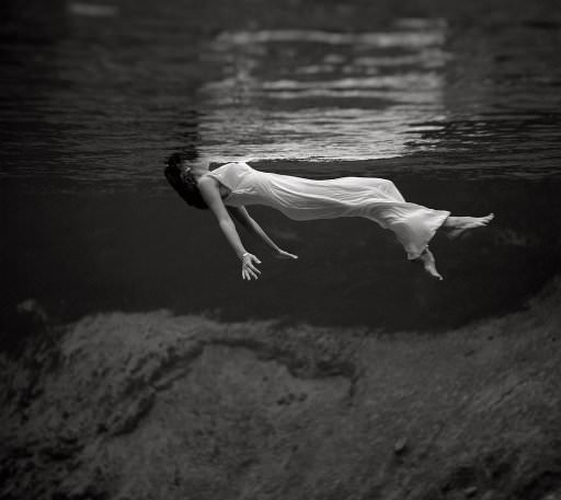 #4 A girl floating in the water at Weeki Wachee Spring, Florida, 1947