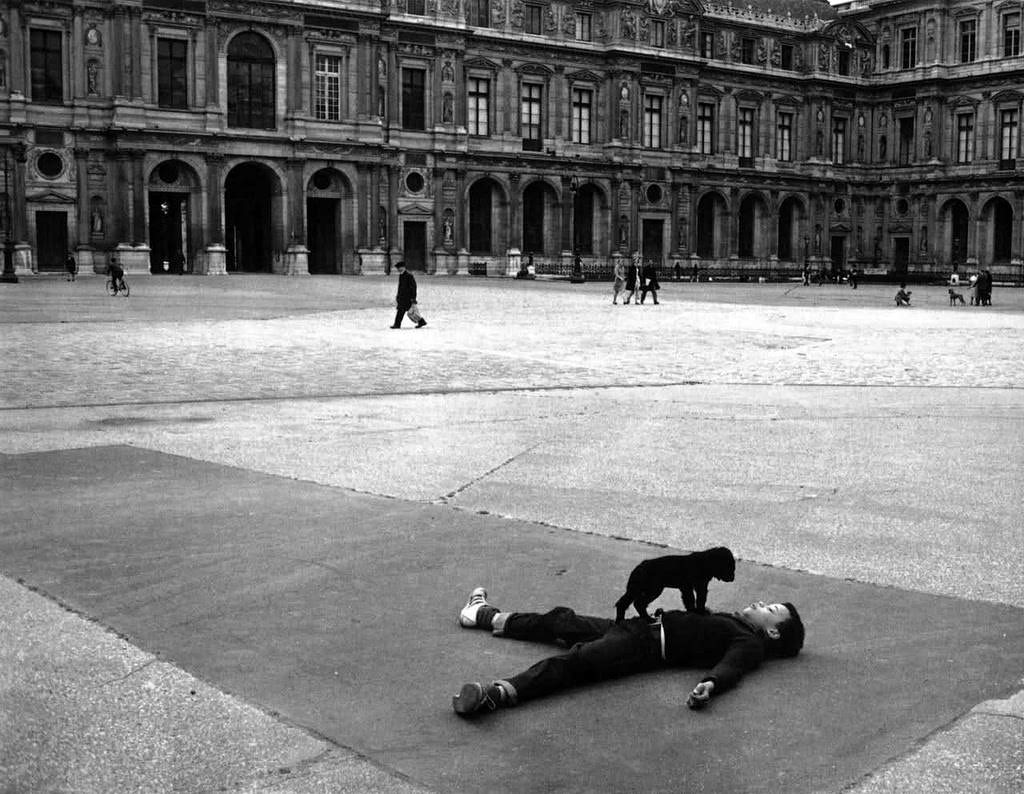 #9 Boy with a puppy at the Louvre, Paris, 1969