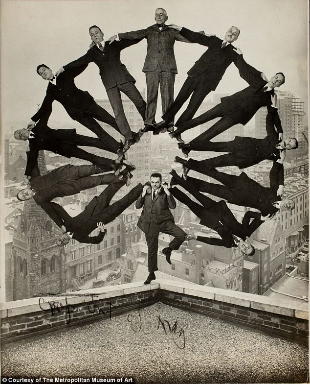 #47 Man on Rooftop with Eleven Men in Formation on His Shoulders, 1930