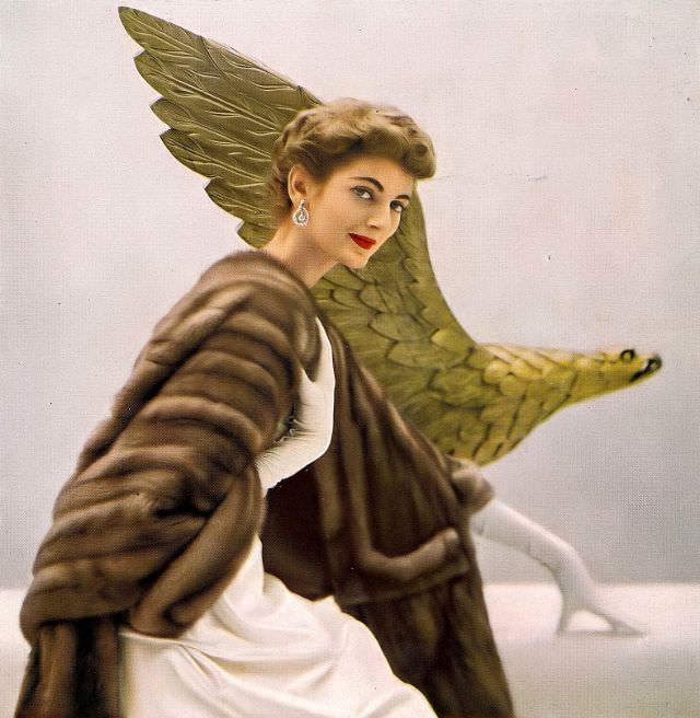 #25 Carmen in Royal Pastel EMBA mink wrap-stole by A.J. Blatte, dress by Ceil Chapman, diamond earrings by Harry Winston, 1951.