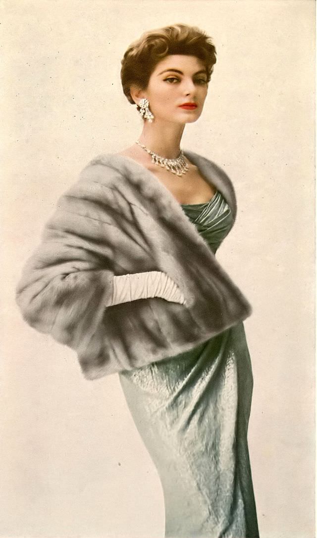 #38 Carmen in Cerulean EMBA mink clutch-bolero by Samuel Schulman Furs, gown by Ceil Chapman, jewelry by Cartier, 1955.