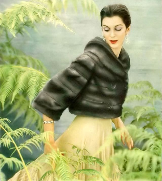 #39 Carmen in an Emba mink jacket by Maximilian, dress by Jane Derby and jewels by Cartier, 1956.
