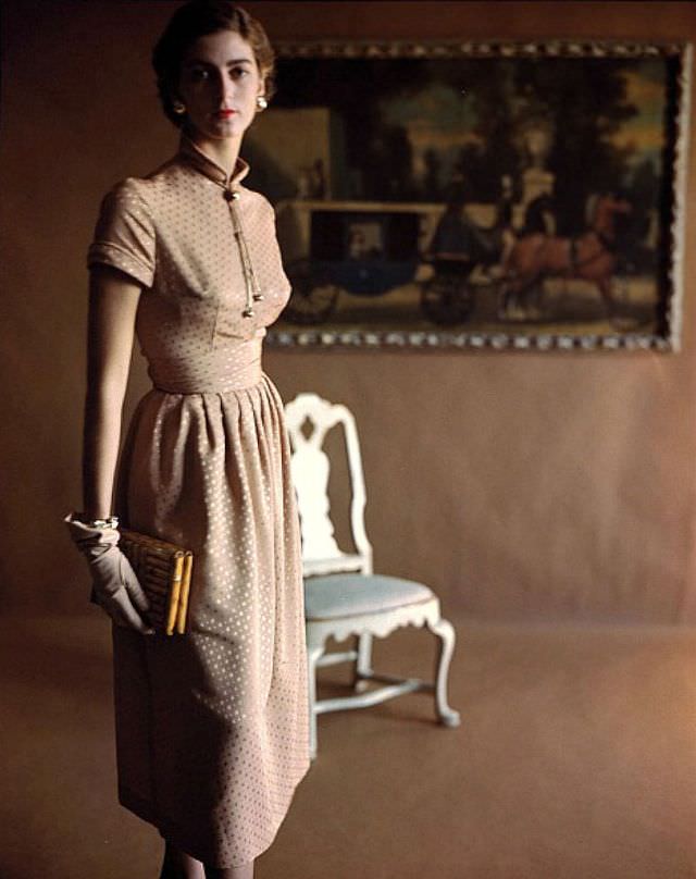 #19 Carmen Dell’ Orefice in beige silk jacquard dress,1948.