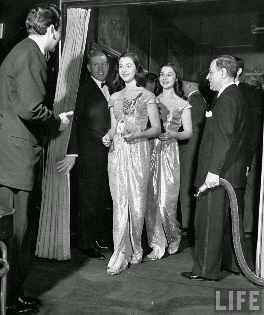 #15 The O’Connor twins Gloria and Consuelo, entering night club, 1947