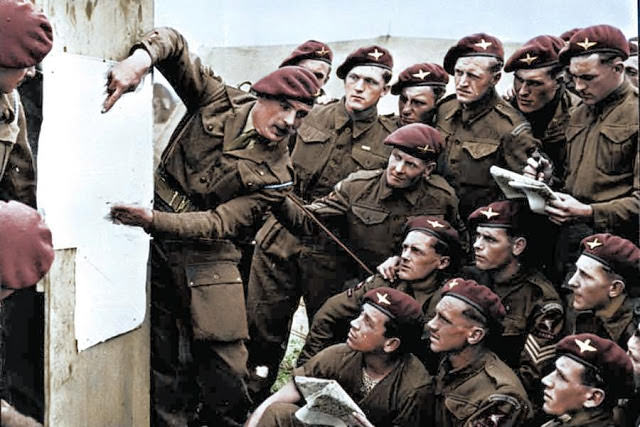 #4 Members of the 22nd Independent Parachute Company, 6th Airborne Division attend a briefing ahead of the D-Day invasion.