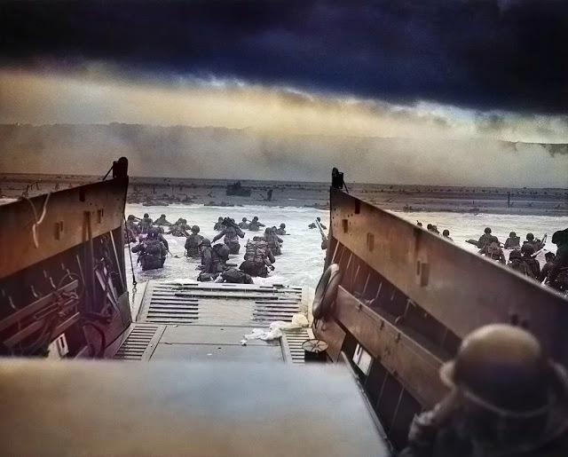 #41 United States Army First Infantry Division disembarking from an LCVP (landing craft) onto Omaha Beach during the Normandy Landings on D Day