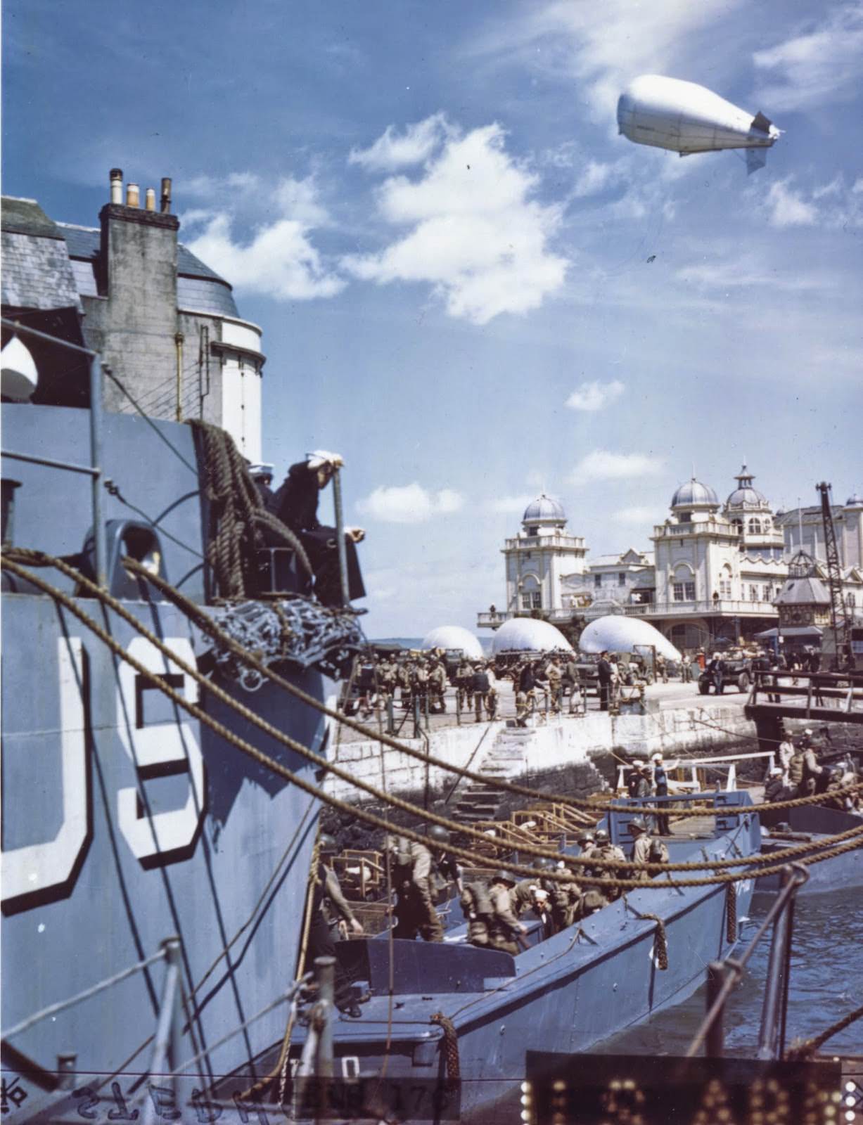 #59 American troops at a British port descend into barges which will take them to troop ships from which they will launch the attack against Hitler’s Fortress Europe.