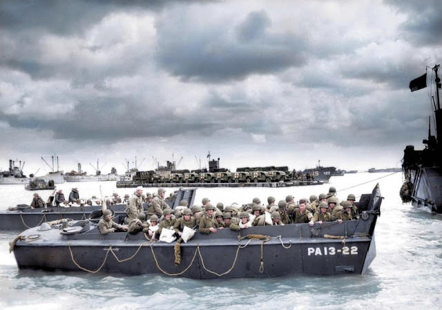 #12 A craft from the USS Samuel Chase lands troops of the US Army First Division on Omaha Beach.