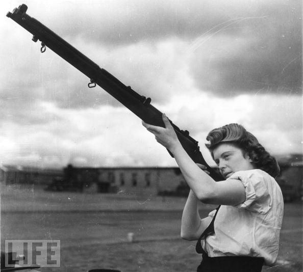 #34 Some 72,000 women would join the Wrens (Women’s Royal Naval Service), freeing British sailors for combat duty by taking on home front jobs, like this Wren, an armorer at a Scottish Royal Air Force Base.