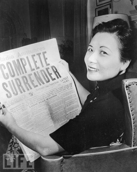 #55 Soong Mei-Ling, the U.S.-educated wife of Chinese leader Chiang Kai-Shek, reads of Japan’s surrender to the Allies in August 1945.