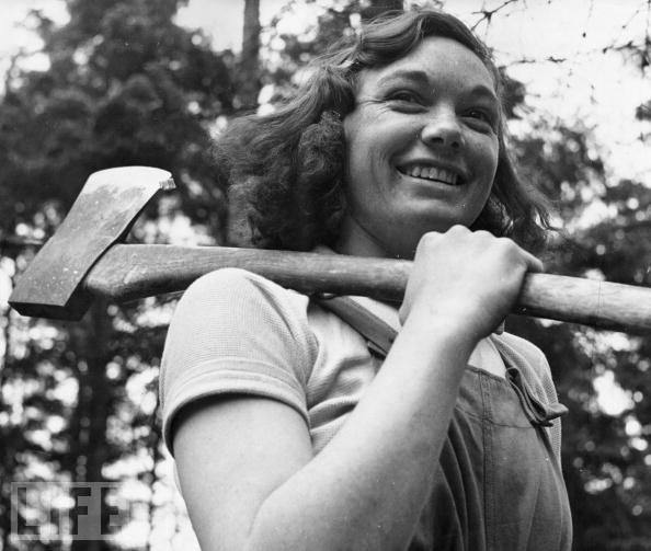 #57 Cicely Clark is one of 4,900 members of The Women’s Timber Corps, dubbed “lumberjills,” at work in a timber camp in 1942 in Suffolk, England as part of the war effort.
