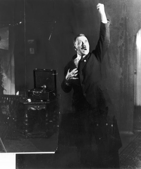 #14 Hitler rehearsing his speech in front of a mirror, 1925