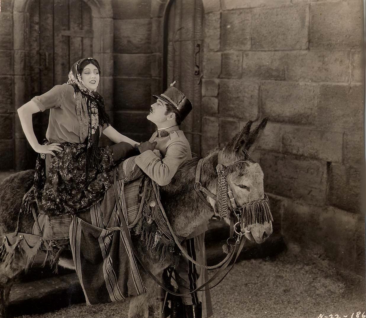 #27 Barbara La Marr with Wallace MacDonald in “Thy Name Is Woman”, 1924