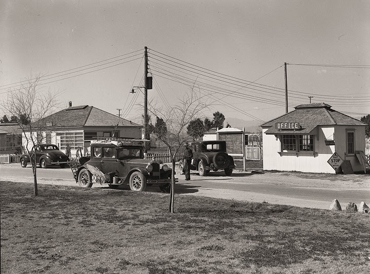 #42 Entering Farm Security Administration (FSA) camp for migratory laborers at Indio. Coachella Valley, California