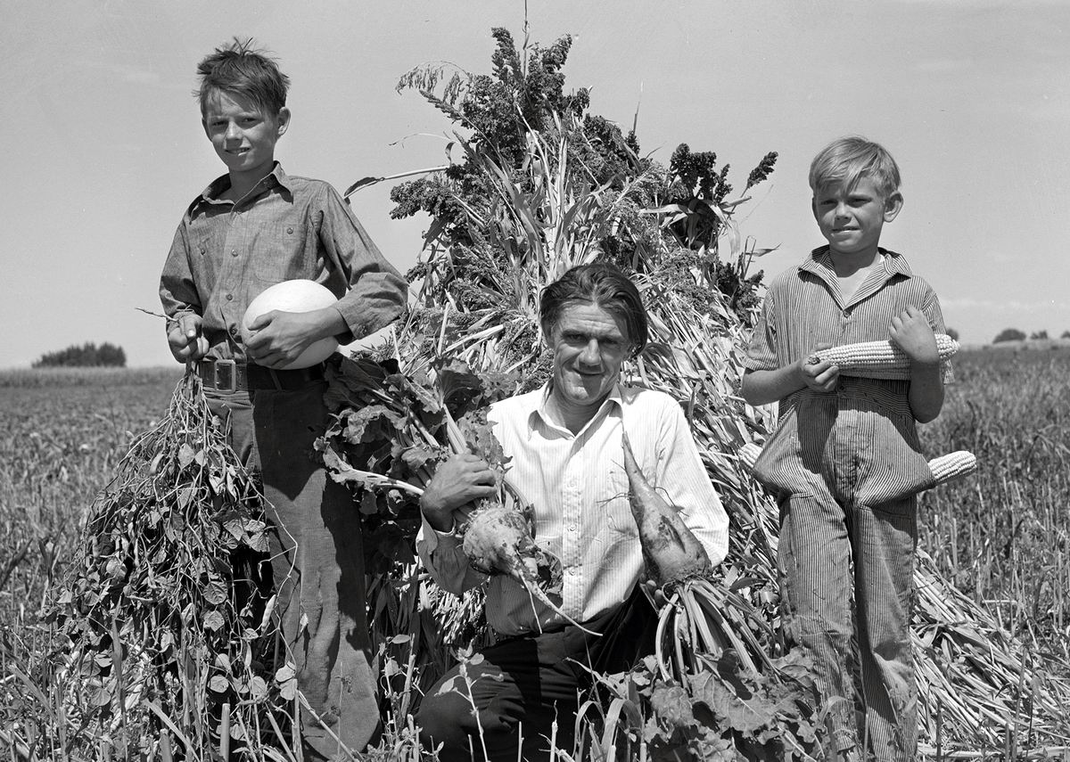 #56 Ernest W. Kirk Jr. with his two sons on their farm near Ordway, Colorado, 1939