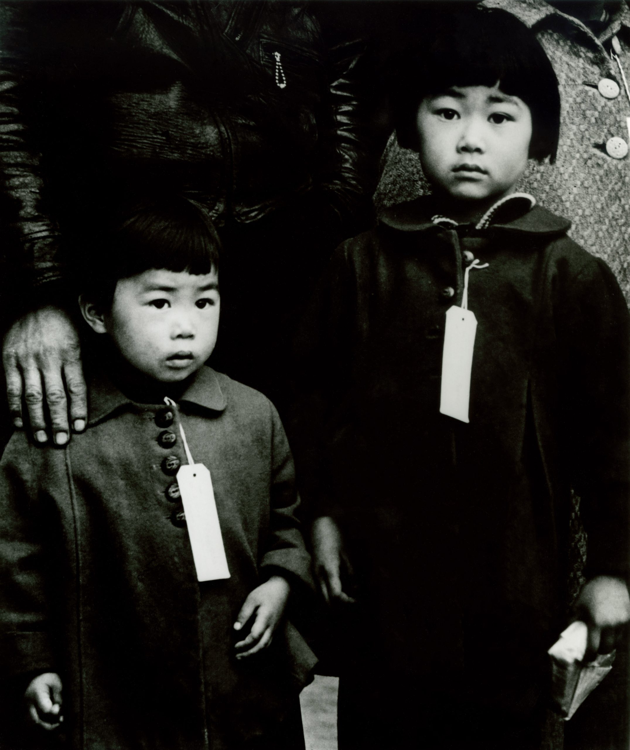 #8 Enforcement of Executive Order 9066. Japanese children made to wear identification tags, Hayward, California, 1942