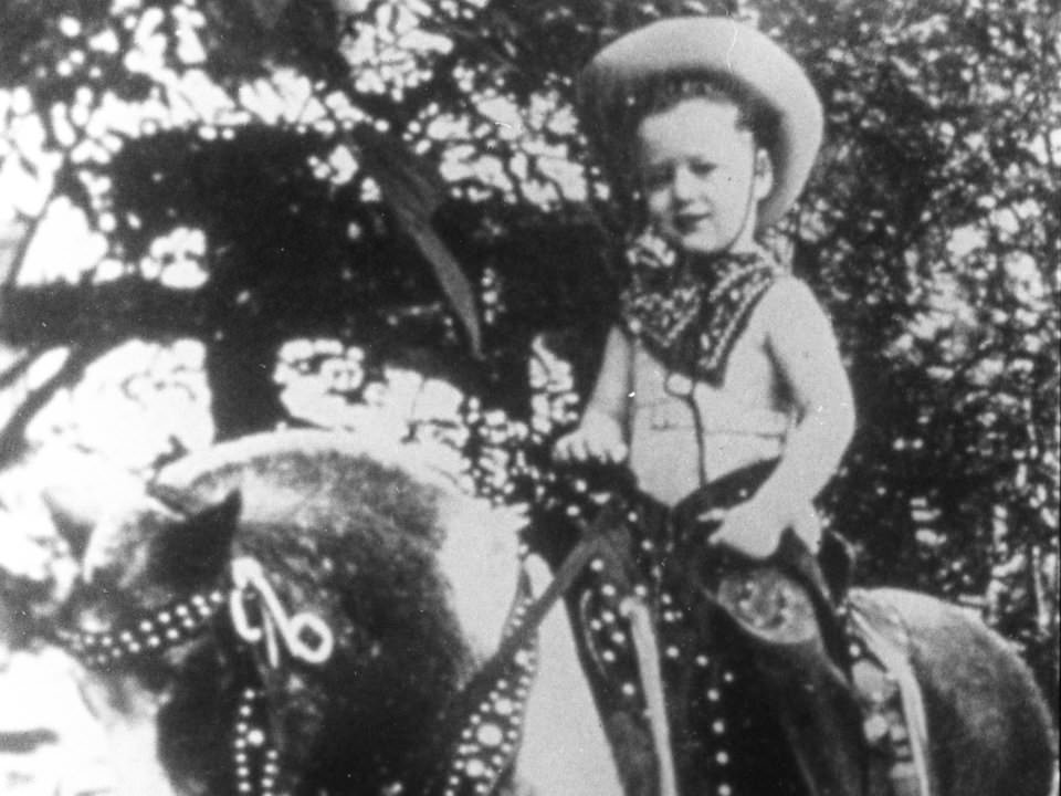 #30 Former US President Bill Clinton on a pony near his childhood home in Arkansas
