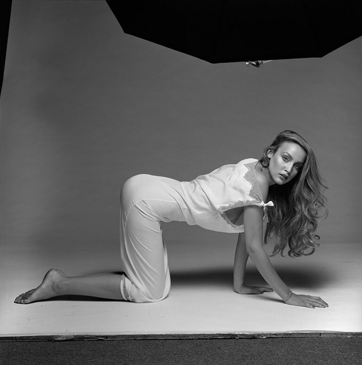 #35 Jerry Hall poses for a lingerie shoot in a London studio, 1978