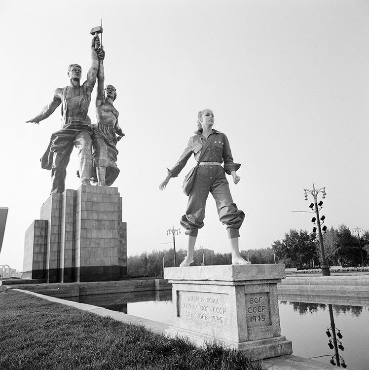 #18 Jerry Hall poses next to a Soviet monument in Russia, 1975