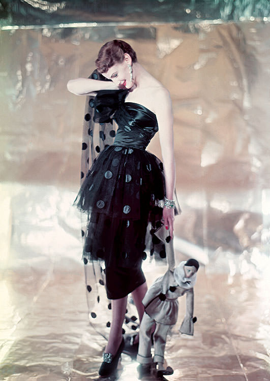 #24 Wenda Rogerson in a Hardy Amies short evening dress, 1952