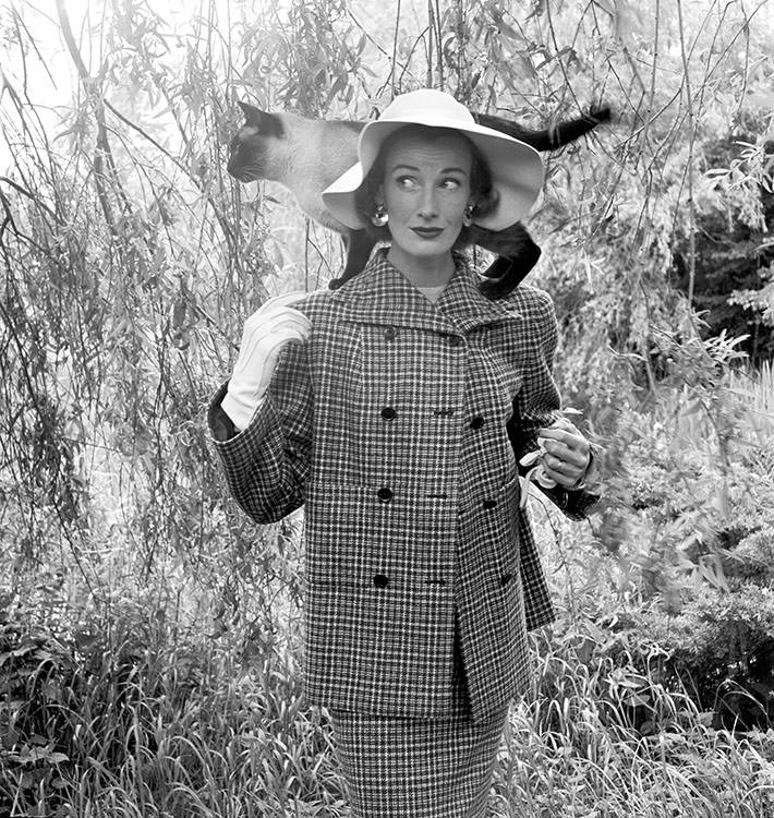 #42 Wenda Parkinson with a cat on her shoulders, 1951