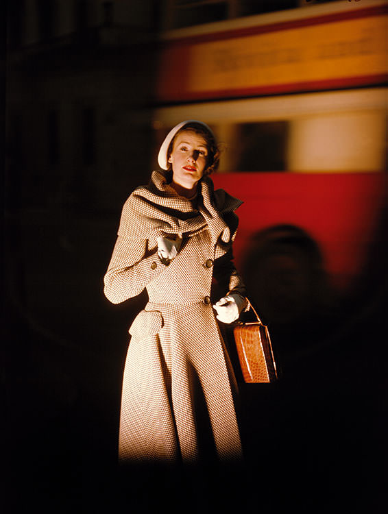#9 Wenda Parkinson wearing a Hardy Amies coat, 1949