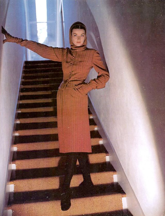 #17 Lenore Simon in a coat by Roxspun and hat by Hattie Carnegie, NYC, August 1944