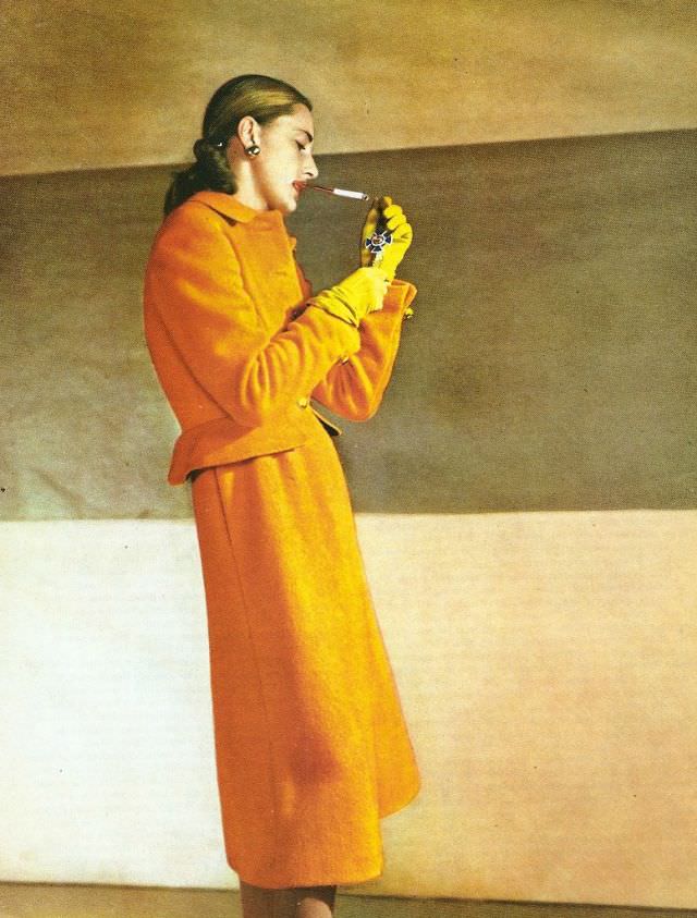 #42 Sandra Payson in suit by Roxspun, hat by Sally Victor, Louise Dahl-Wolfe’s studio in New York City, March 1947
