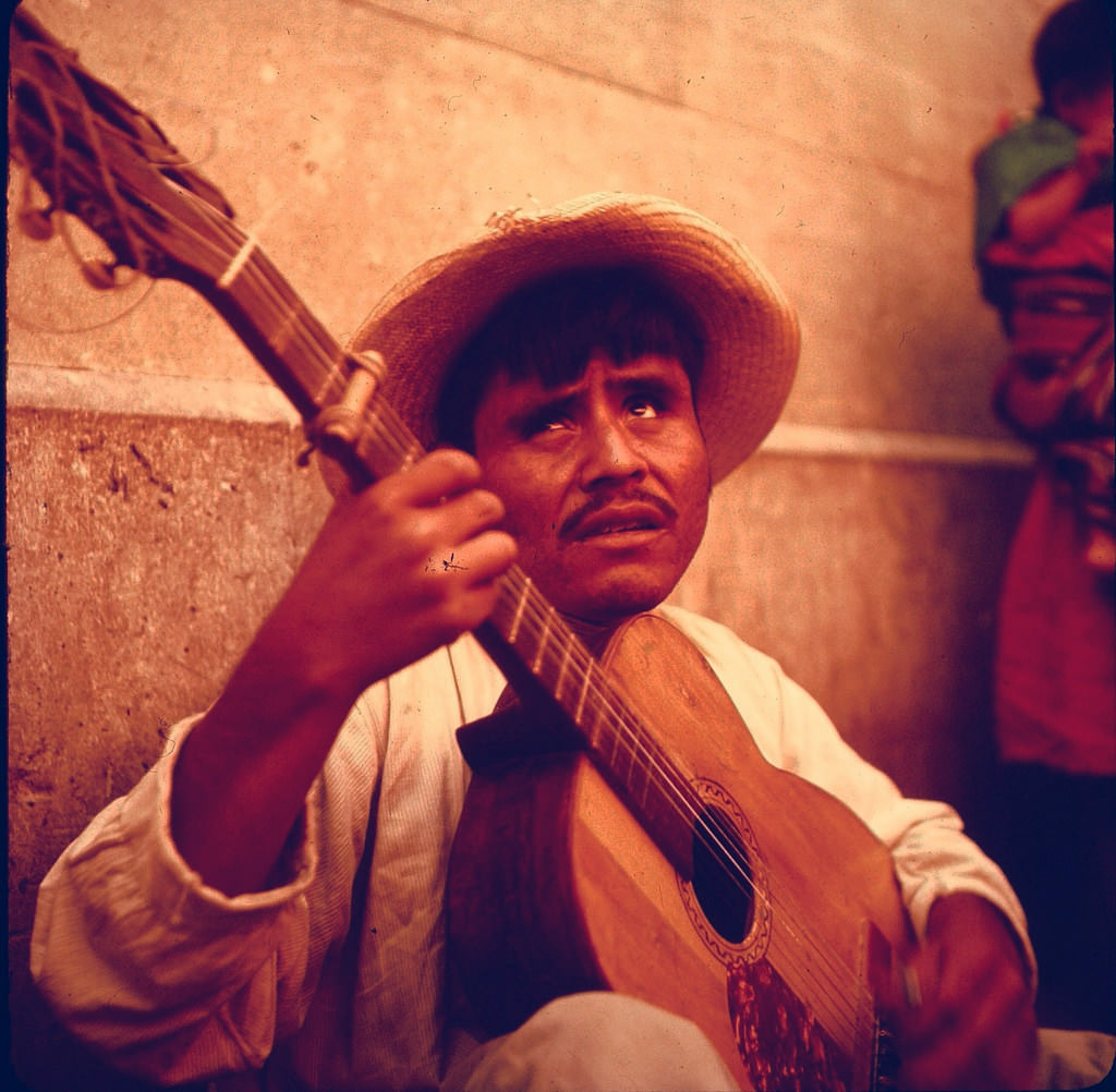 #7 Man with guitar in Cuzco, Peru, 1960