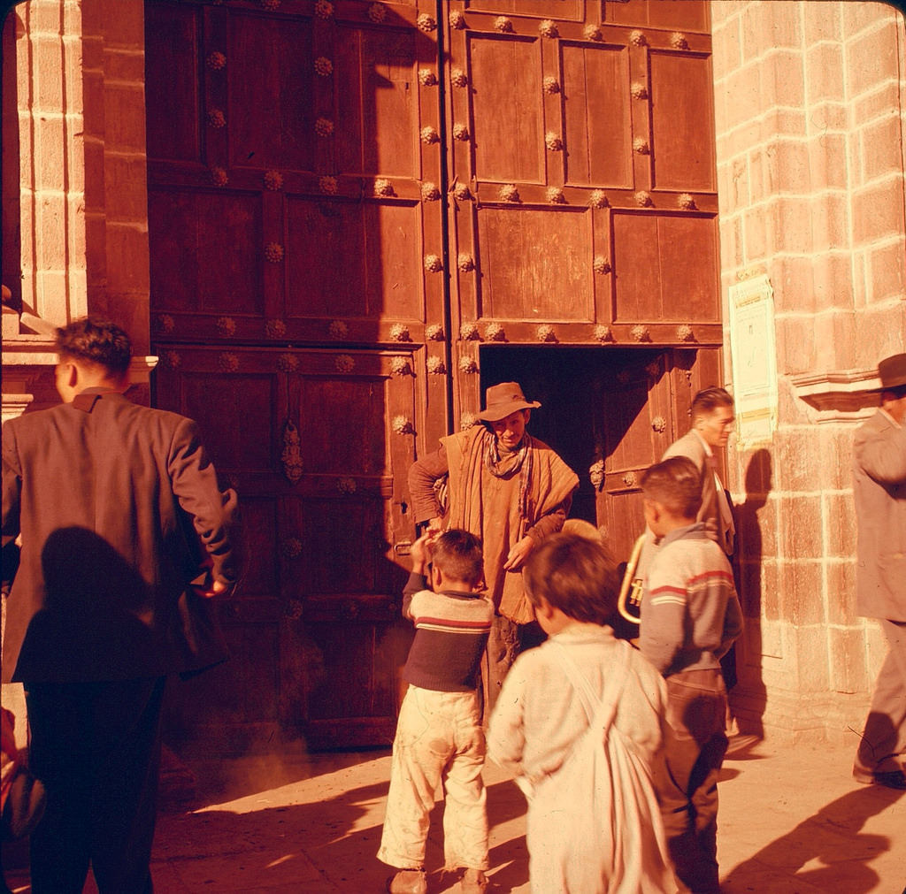 #28 People at the door of church or cathedhral, Cuzco, Peru, 1960