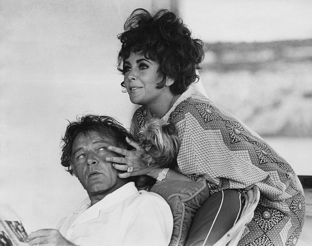 #13 Liz Taylor and Richard Burton with their dog