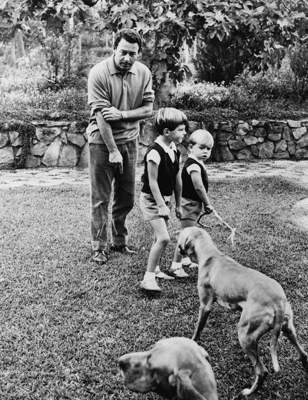 #35 Alfonso de Hohenlohe and children playing with dogs