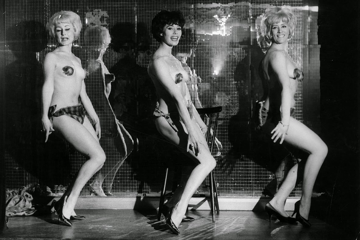 #24 Dressed in minuscule fur bikinis, Kean Fluffles, Angela Parker and Audrey Crane perform in London’s Casino de Paris in Soho, 1963