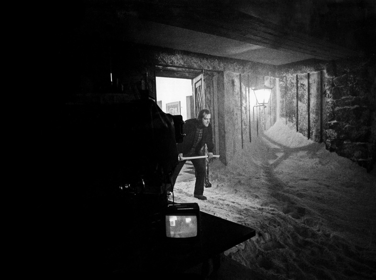 #41 Jack Nicholson on the exterior set of the Overlook Hotel at EMI Elstree Studios.