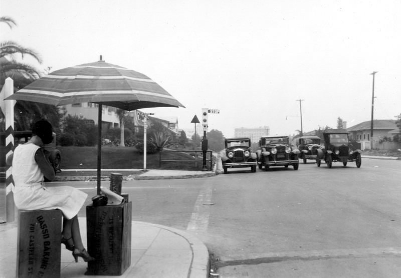 #2 Girl waiting for bus on Beverly Boulevard, interesection at Van Ness, July 17, 1931
